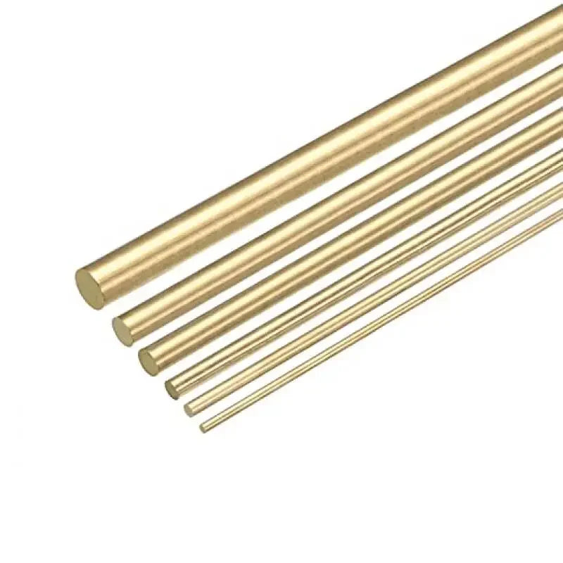 A collection of parallel brass bar rods or wires arranged diagonally.