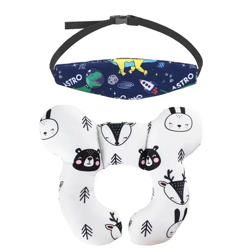 White fabric head and neck support pillow for a baby with a safety strap