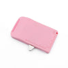 A pink magnetic sewing guide gauge with a ruler and seam ripper tool.