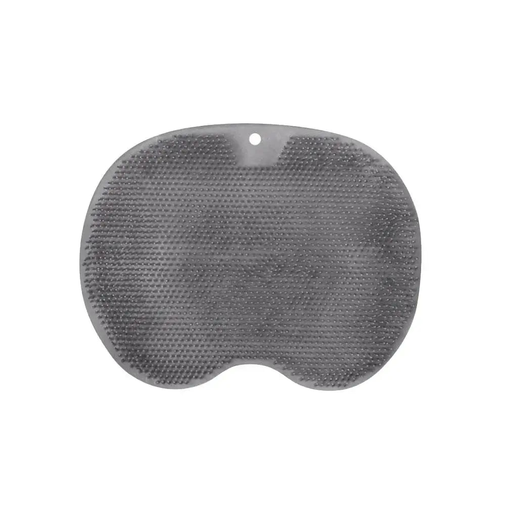 Gray ergonomic silicone foot scrubber with a suction base