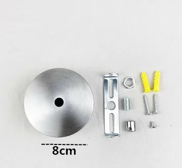 A polished stainless steel ceiling mount canopy for pendant lights shown with various hardware components.