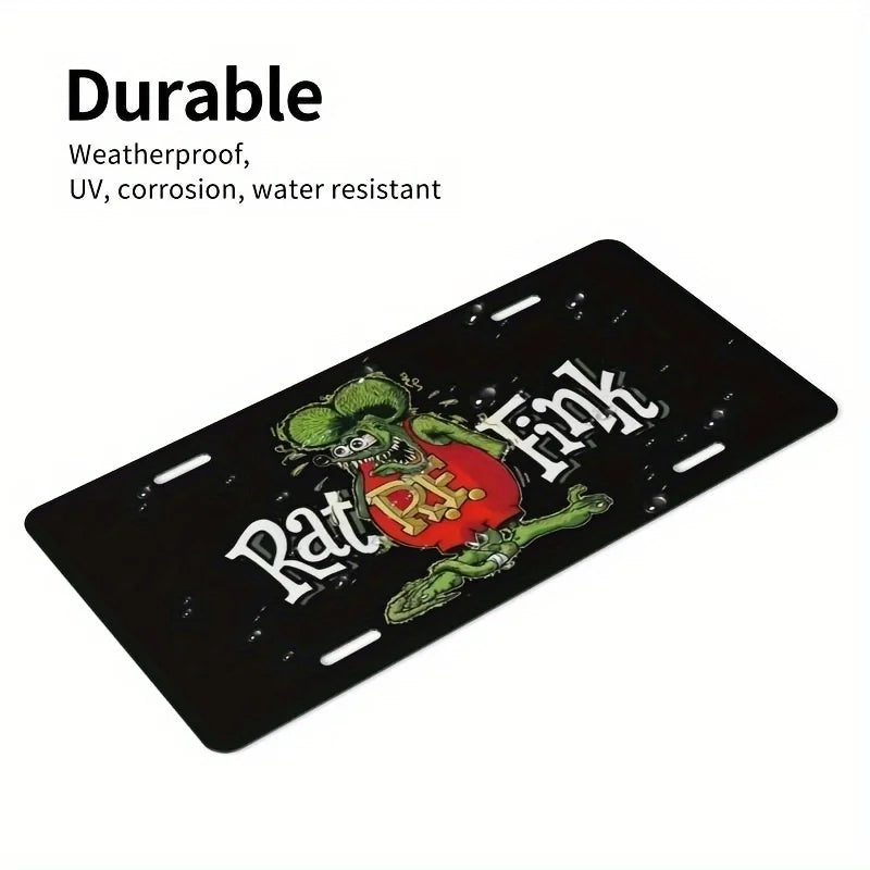 A black aluminum license plate sign featuring a vintage Rat Fink design with red and green accents.