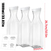 A set of three clear glass refillable laundry detergent dispenser bottles with white caps and labels.
