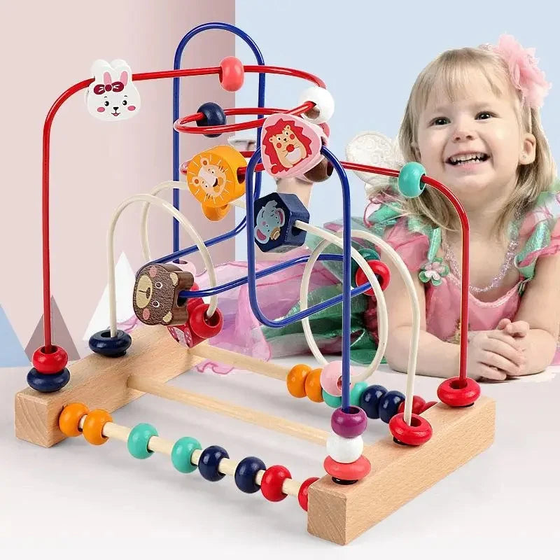 A wooden bead maze toy with colorful beads and rings is set up on a light wooden base for toddlers.