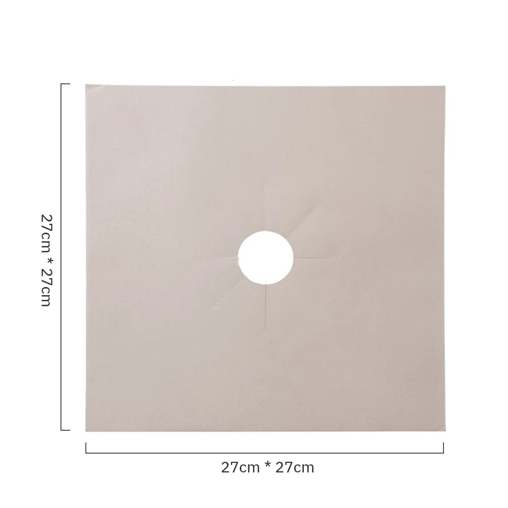 A square beige non-stick gas stove protector mat with a circular cutout in the center.