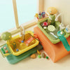 A kids electric kitchen sink playset with running water and fishing fun featuring various food items and tools.
