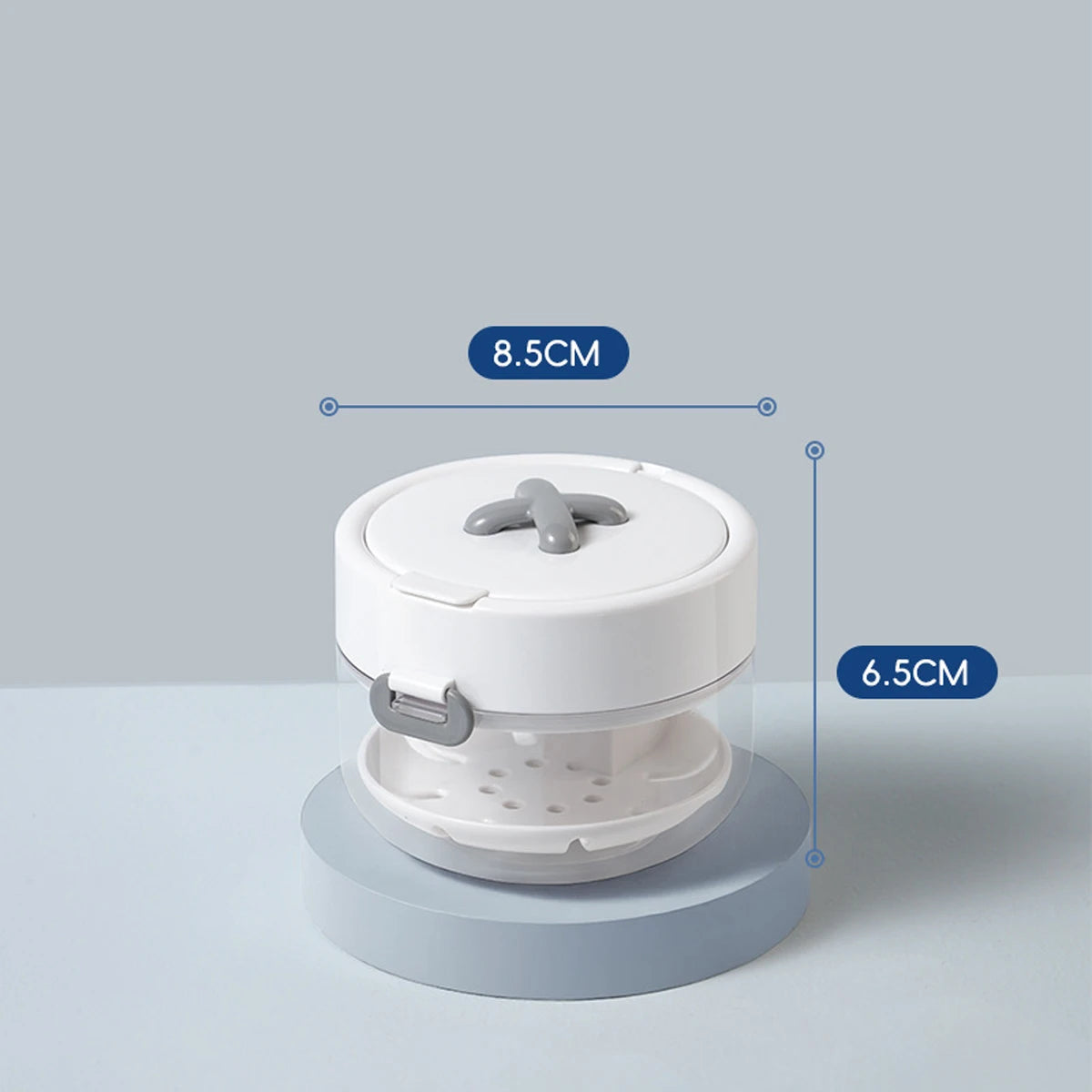 A white portable denture case with a lid and cleaning brush storage, shown from above.