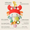 A colorful hanging baby rattle and teether toy featuring a cartoon sea creature with various attachments for sensory play.