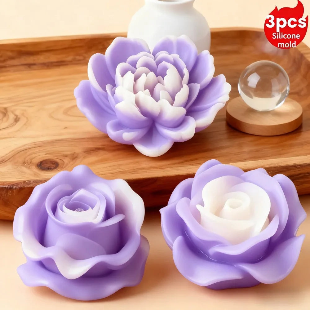 Three silicone molds shaped like purple and white roses and peonies displayed on a wooden board.