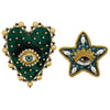 A heart-shaped patch adorned with green fabric, gold beads, and a central iridescent eye design.