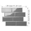 A rectangular mosaic of gray self-adhesive PVC tiles used as wall stickers.