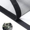 Close-up view of a black self-adhesive mosquito net window screen with a zipper detail.