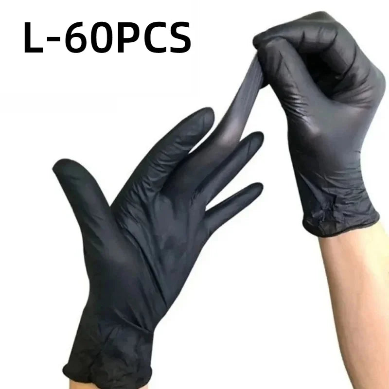 A hand wearing a black disposable nitrile glove is shown, demonstrating the product.