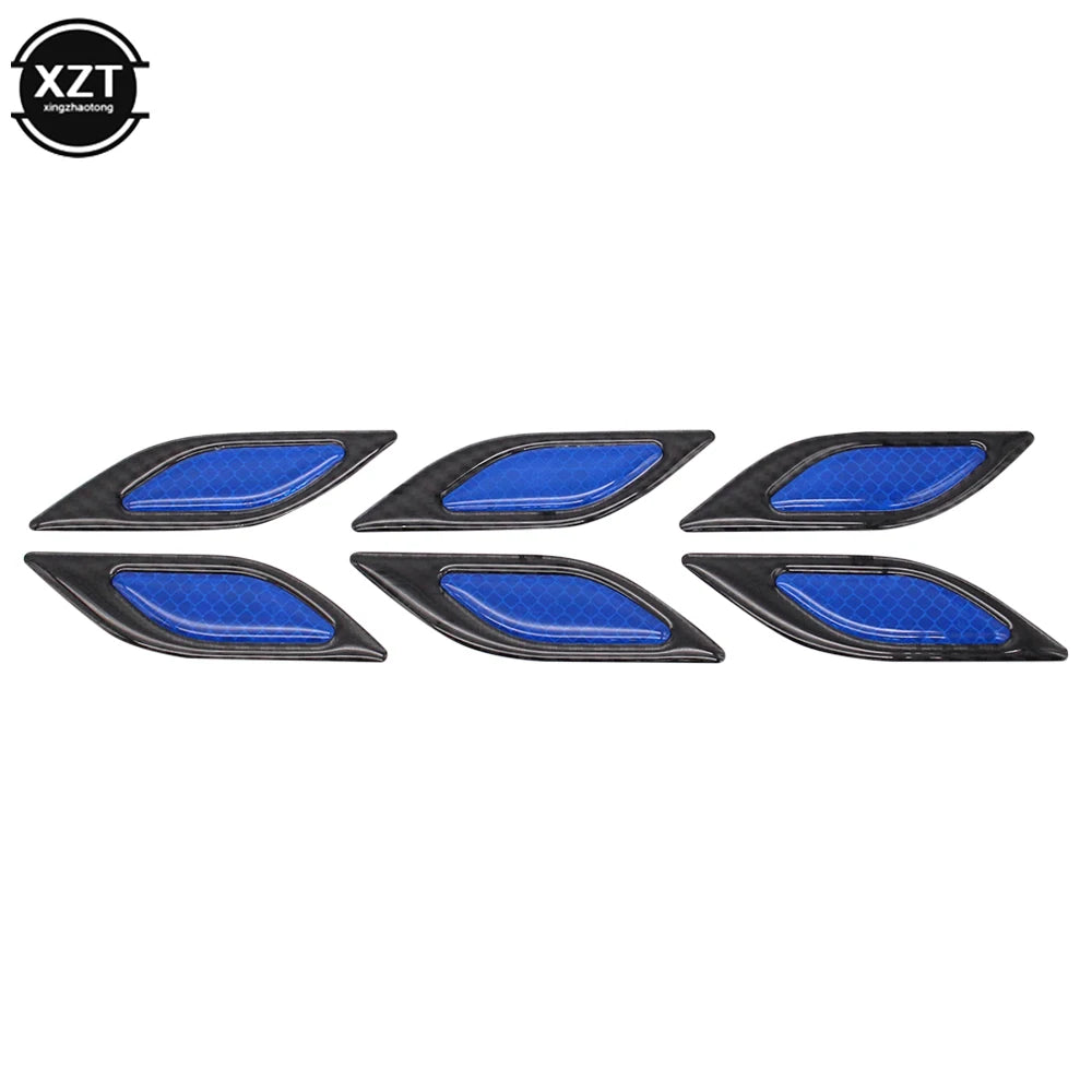 A set of six reflective blue carbon fiber car styling strips.