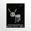 Black canvas print featuring a stylized, white, horned creature drawing on a black background.