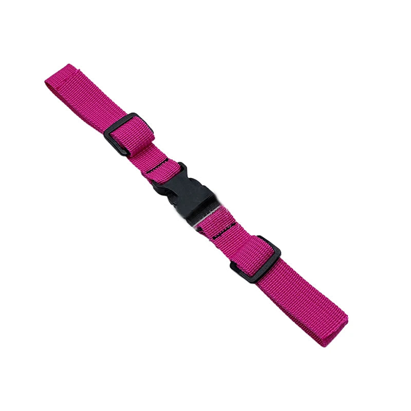 A pink and black adjustable backpack chest strap with a plastic buckle.