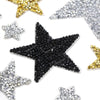 A collection of star-shaped rhinestone patches in black, silver, and gold glitter.