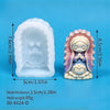 A white silicone mold shaped like a praying girl is shown next to the finished pink and purple praying girl figure.