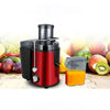A red and black centrifugal juicer appliance is shown with fresh fruits and vegetables in the background.