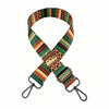 An elegant magnolia jacquard adjustable crossbody bag strap featuring multicolored geometric patterns.