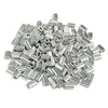 A pile of silver aluminum double barrel crimp sleeves for wire rope.