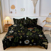A black duvet cover set featuring a forest mushroom pattern displayed on a bed.