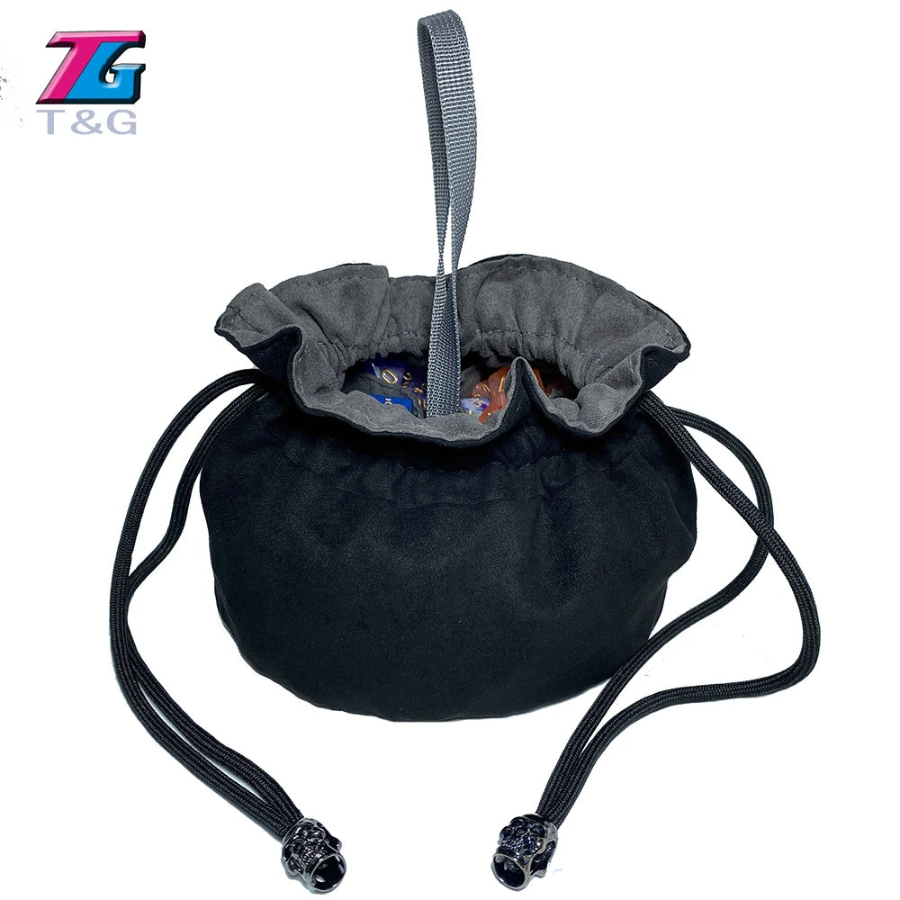 Black velvet dice storage pouch with a drawstring and black cord.