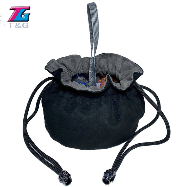 Black velvet dice storage pouch with a drawstring and black cord.