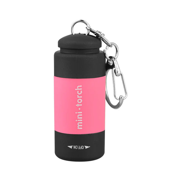 Schwarze Mini-Laterne mit rosa Körper und Metall-Anhänger.