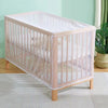 A clear, breathable mosquito net crib for a baby, featuring light pink framing and netting.