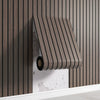 A close-up of a vertical wood slat wall panel in a natural brown tone mounted on a white shelf.
