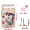 A wooden reward jar filled with pink and brown star-shaped wooden pieces for positive behavior