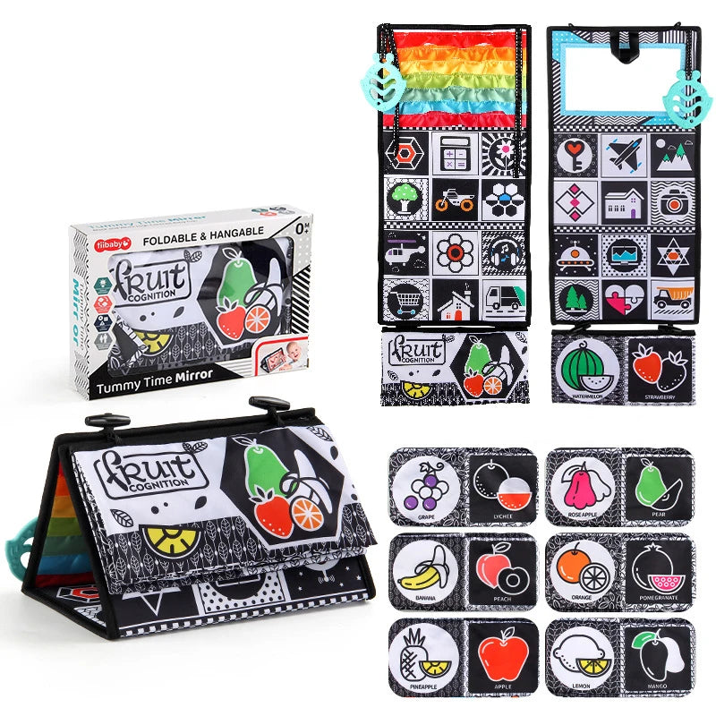 A foldable and hangable fruit cognition cloth book with a tummy time mirror for babies featuring various fruits and vegetable