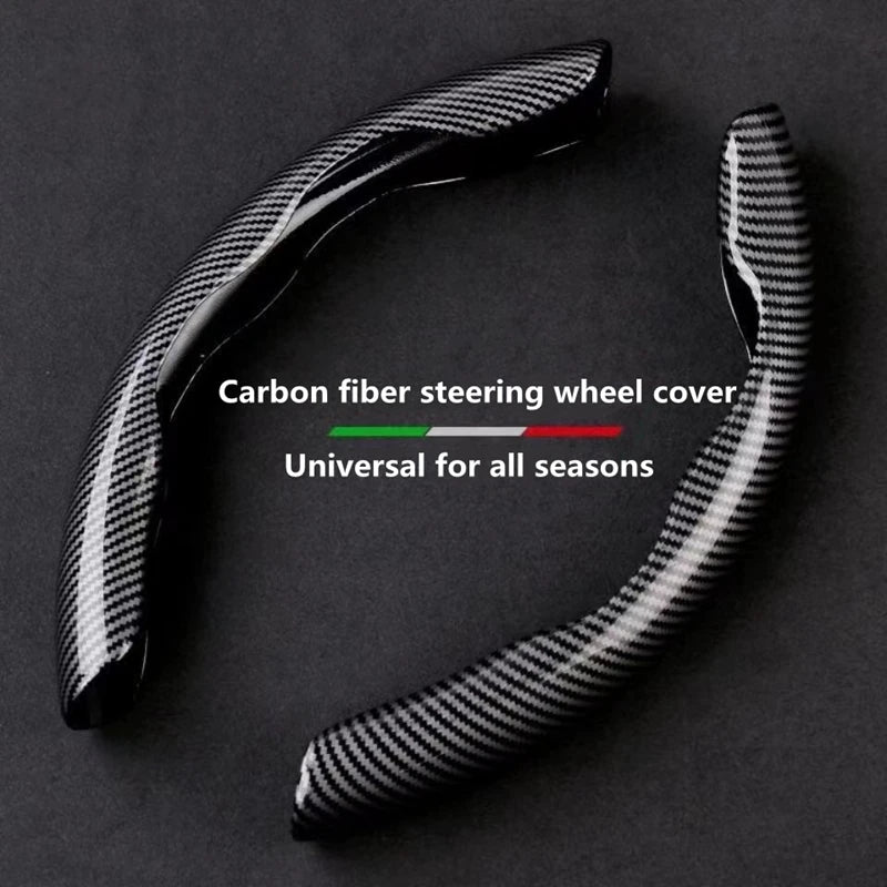 A close-up view of a black carbon fiber steering wheel cover, showing its texture and design.