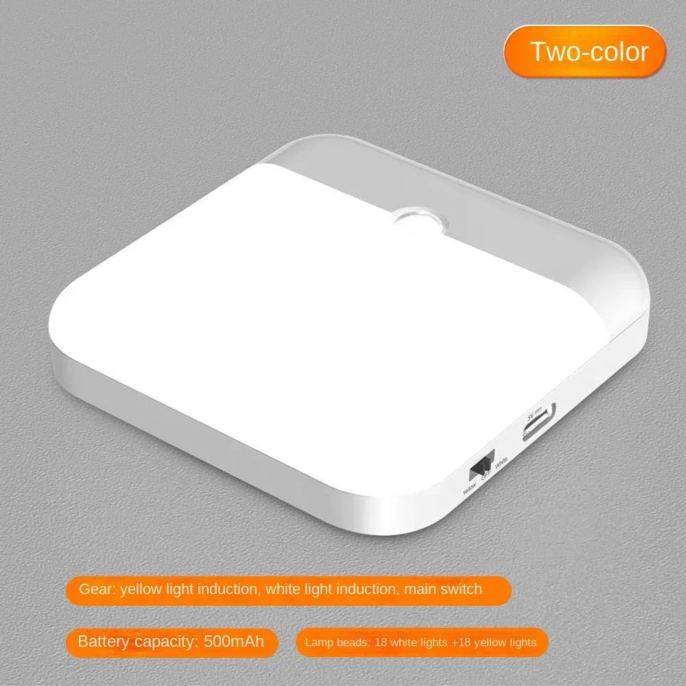 A white rechargeable motion sensor night light with a rectangular body and a round lens.