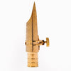 Gold-plated brass tenor saxophone mouthpiece with a conical, pointed design.