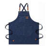 Navy blue canvas apron with straps and large front pockets