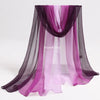 Purple and gray sheer fabric playsilks draped in a flowing curtain style for imaginative play