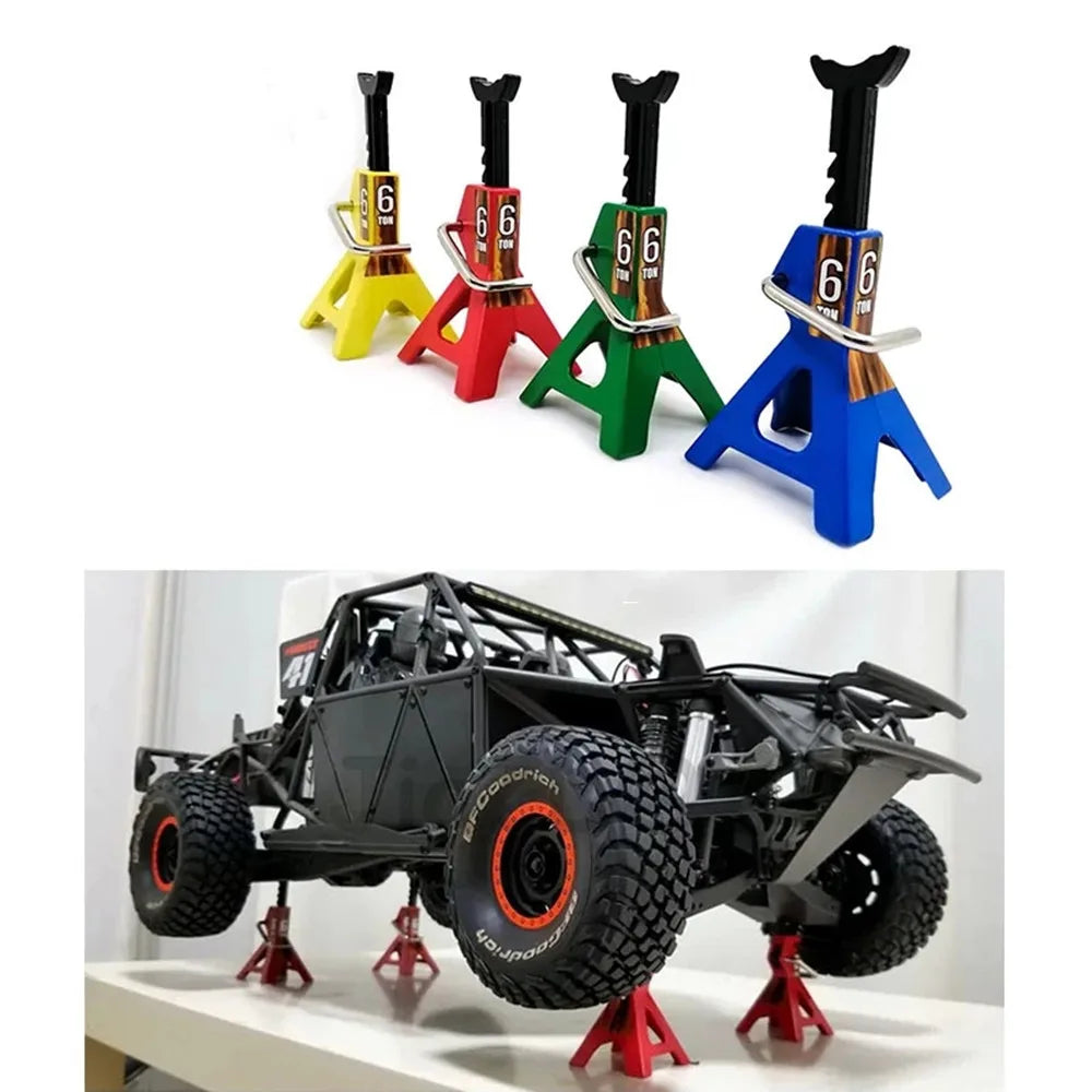 A set of six 1/10 scale metal RC jack stands in various colors including yellow, red, green, and blue.