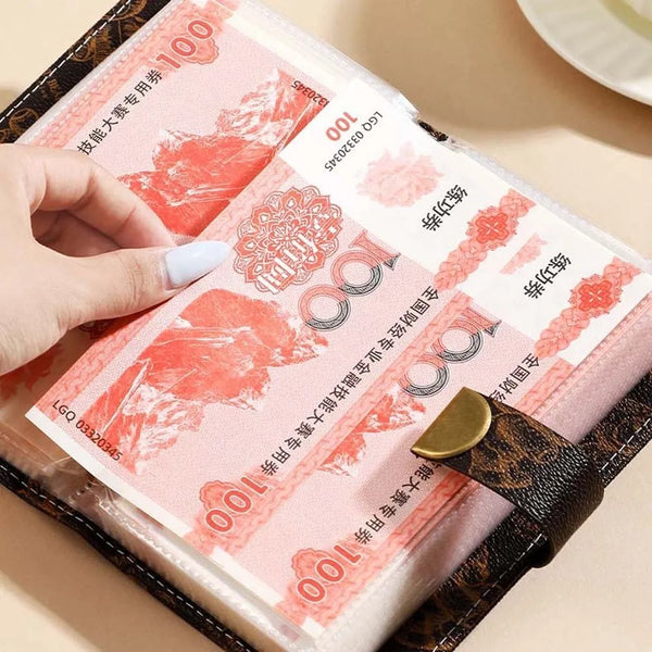 A hand is shown opening a pink and gold money organizer notebook with code protection features.