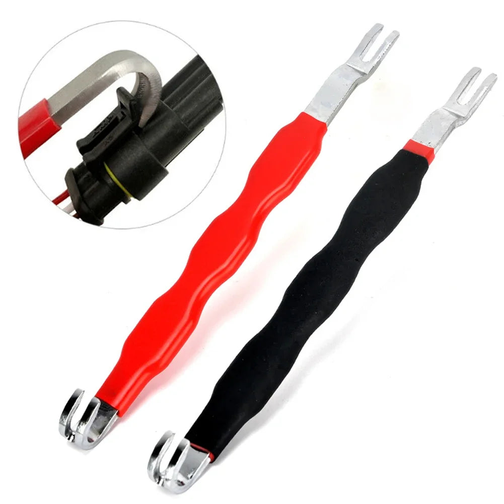 A set of red and black automotive electrical terminal connector removal tools with silver jaws.