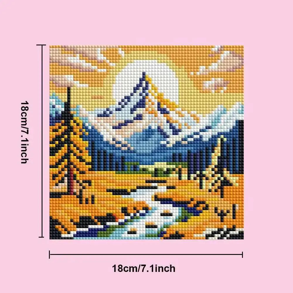 Diamond painting kit featuring a sunset mountain landscape with snow-capped peaks and a flowing river.