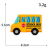 A yellow school bus iron-on patch with blue windows and the text SCHOOL BUS on it.