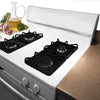 A white gas stove with four black burner protectors is shown open on a countertop.