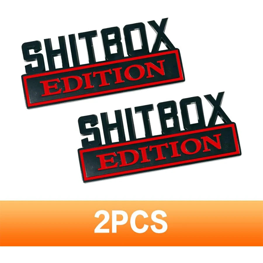 Zwei schwarze und rote SHITBOX EDITION Aufkleber oder Abzeichen für den Automobilgebrauch