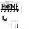 Black rustic iron wall hooks shaped like letters for home organization and storage