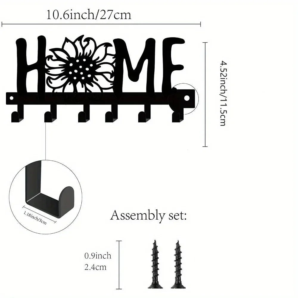 Black rustic iron wall hooks shaped like letters for home organization and storage