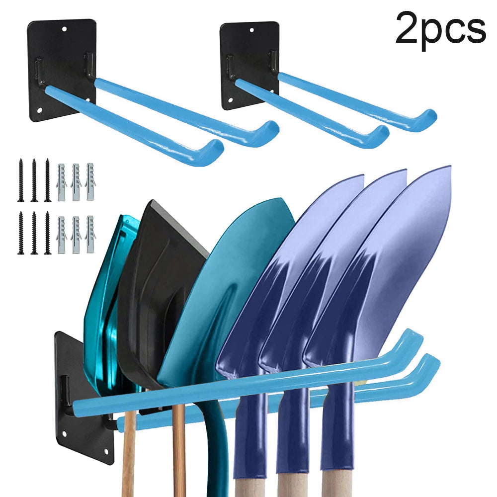 Two black wall-mounted racks with blue tool holders and several garden tools.