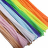 A bundle of colorful chenille craft stems in a rainbow gradient, showing various shades of pink, purple, blue, green, and ora
