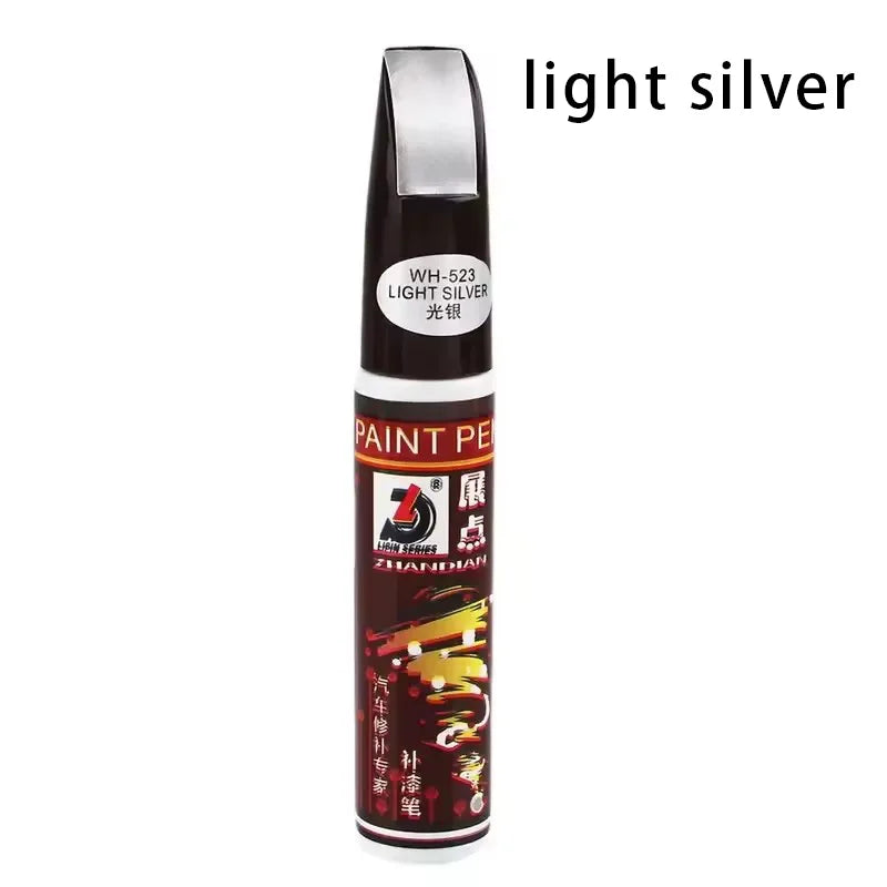 Silver paint repair pen with a black cap and gold lettering for touch-up work